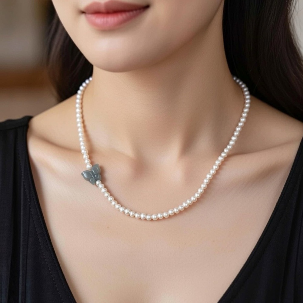 Elegant Pearl Necklace with Jade Butterfly Accent
